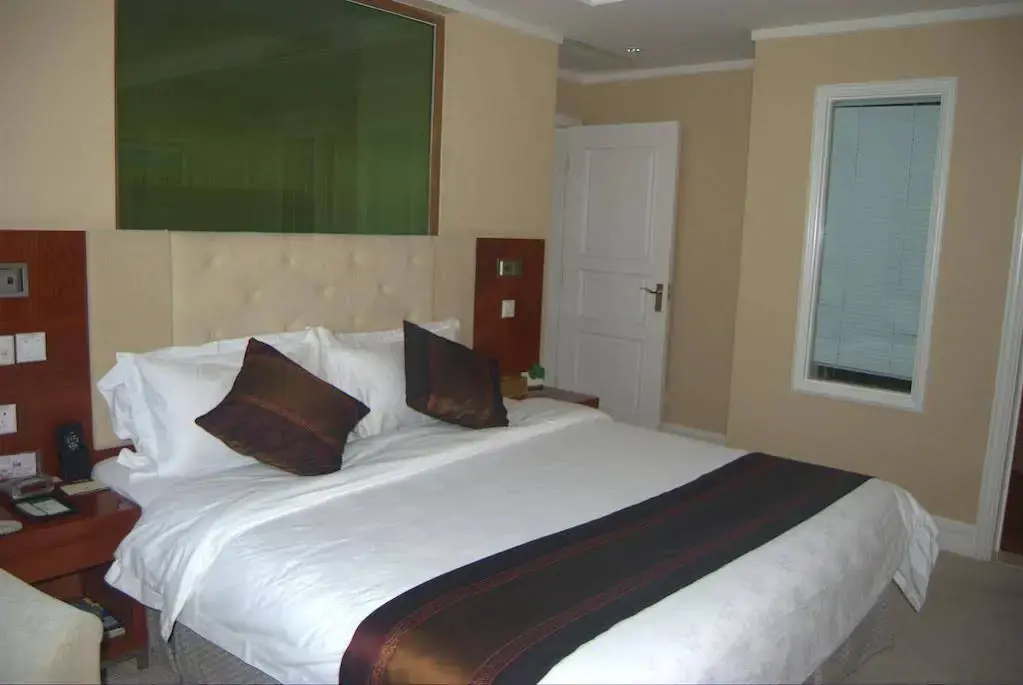 Корла: Kangcheng Jian Guo International Hotel