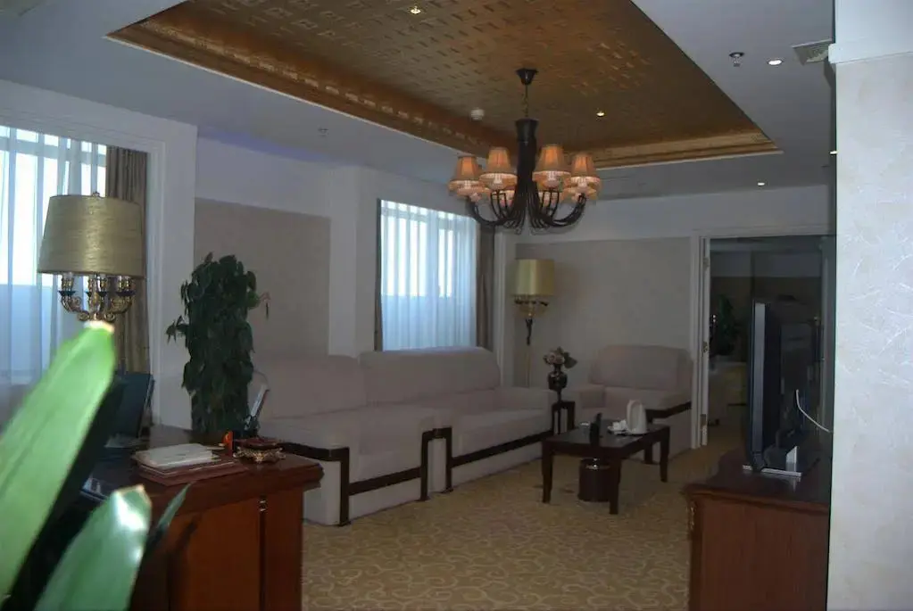 Корла: Kangcheng Jian Guo International Hotel