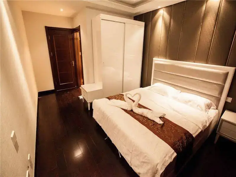 Циндао: Qingdao Bedom Apartment Jinsha Bay