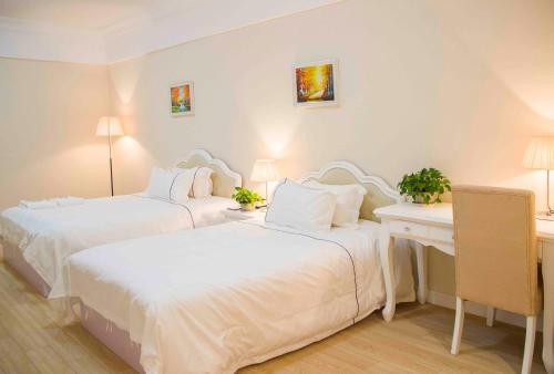 Циндао: Qingdao Bedom Apartment Jinsha Bay