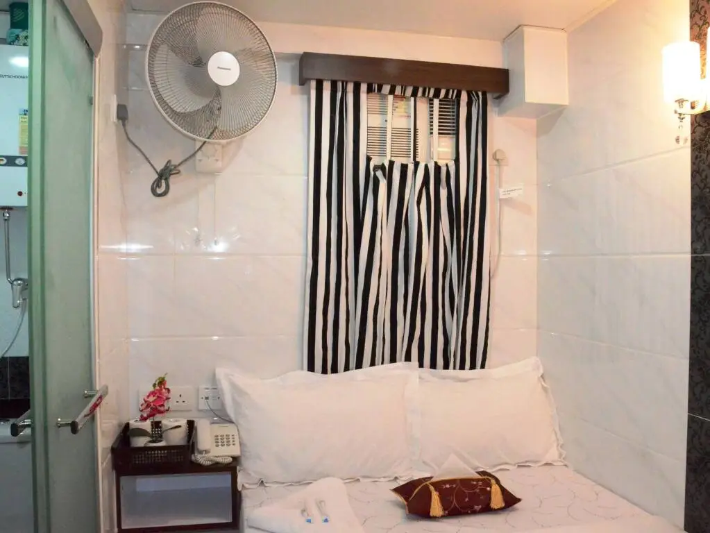 Гонконг: Kowloon TST Guest House