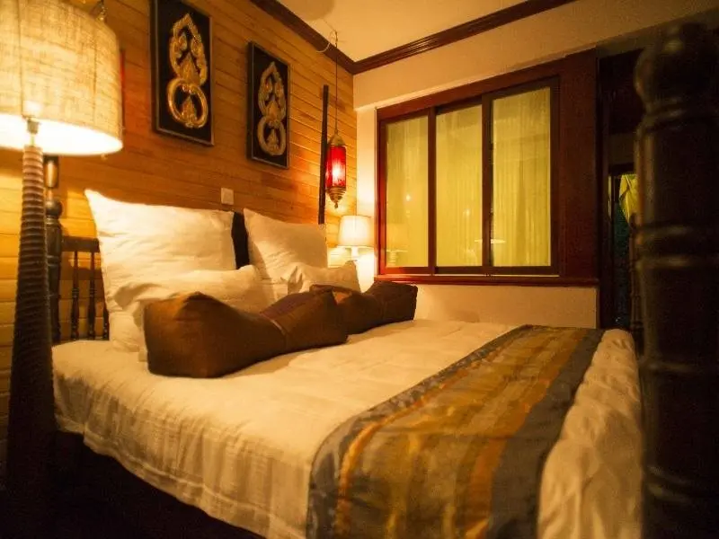 Цзинхун: Xishuangbanna Elephanthome Yododo Inn