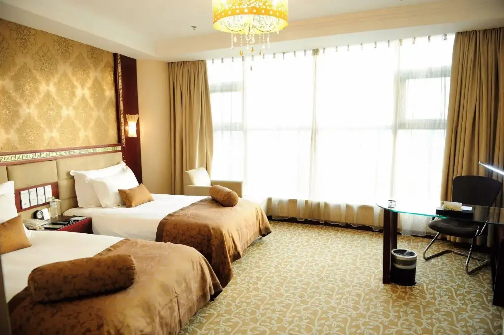 Яньтай: Vienna International Hotel Shandong Yantai FTA Jinshatan Xingyi Square