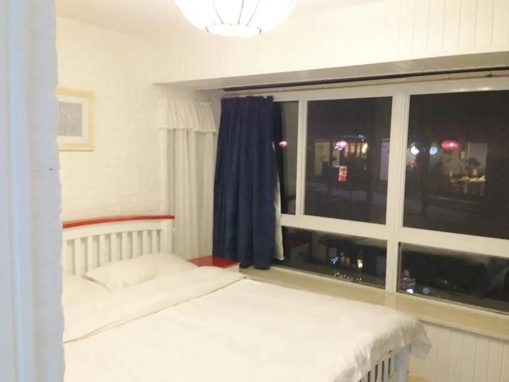 Цзясинь: Moonlight Bay Inn