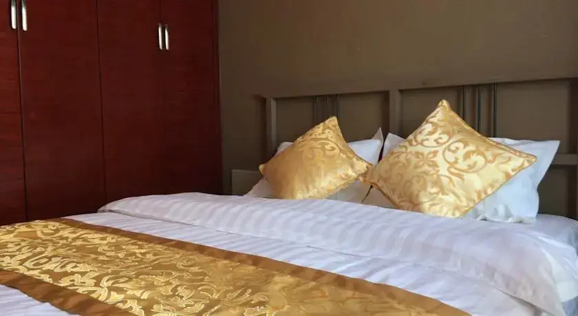 Далянь: Jiahao Hotel Style Apartment