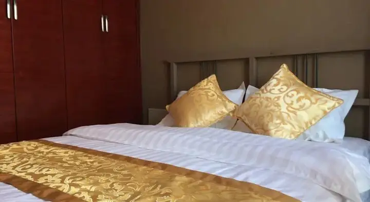Далянь: Jiahao Hotel Style Apartment