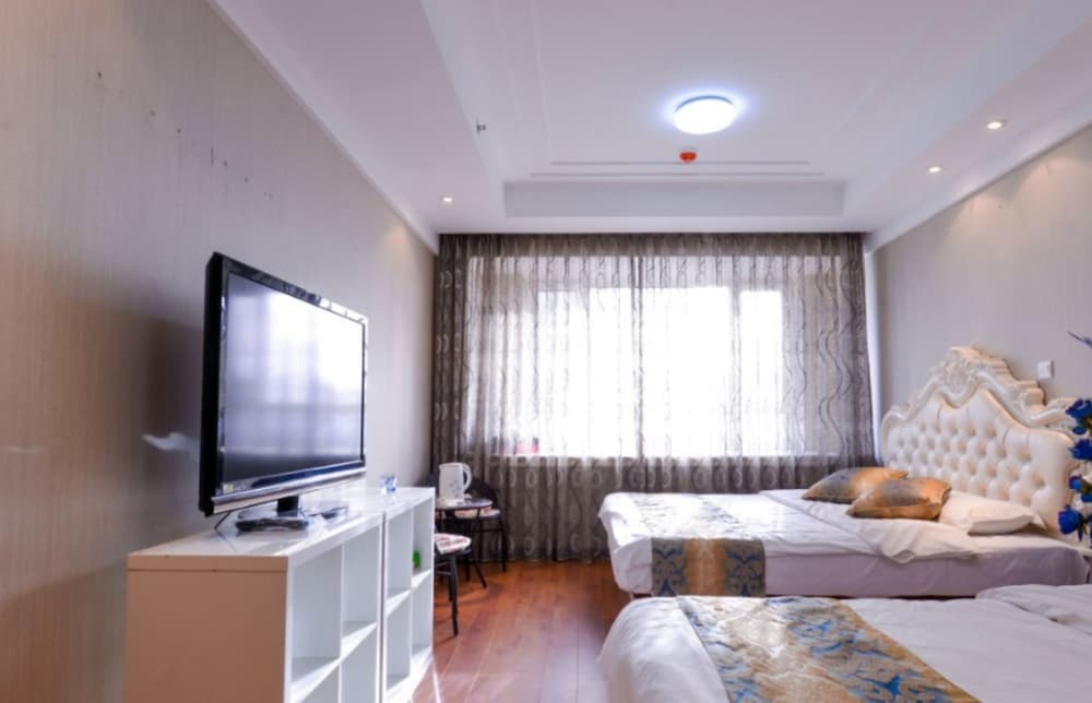Далянь: Dalian Xinghai Yijia Apartment