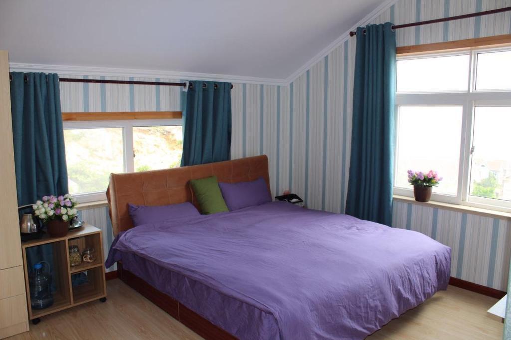 Циндао: Qingdao Xiufengge Inn