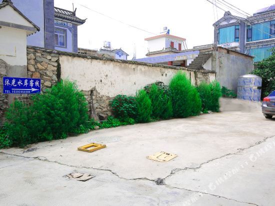 Дали: Dali Muguangshuian Hostel