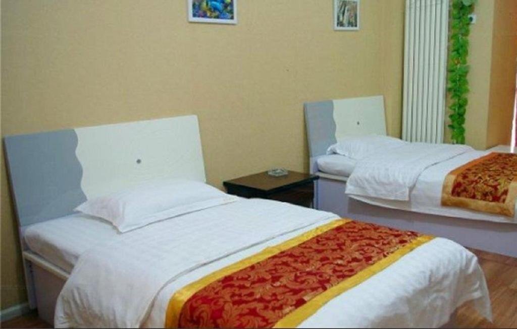Ксучанг: Aizhiyuan Inn Junjing Shangdu