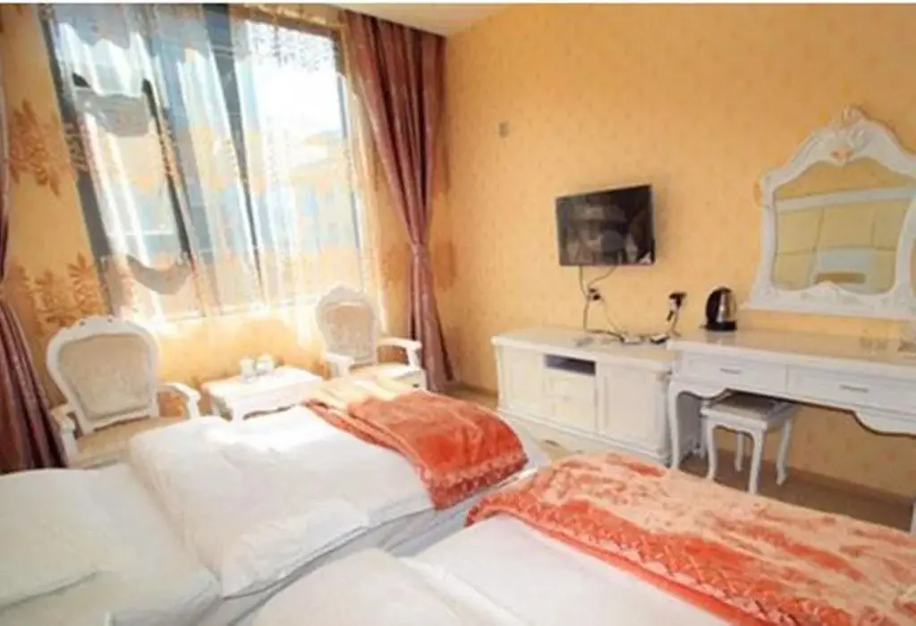 Дали: Mingge Busniess Hotel
