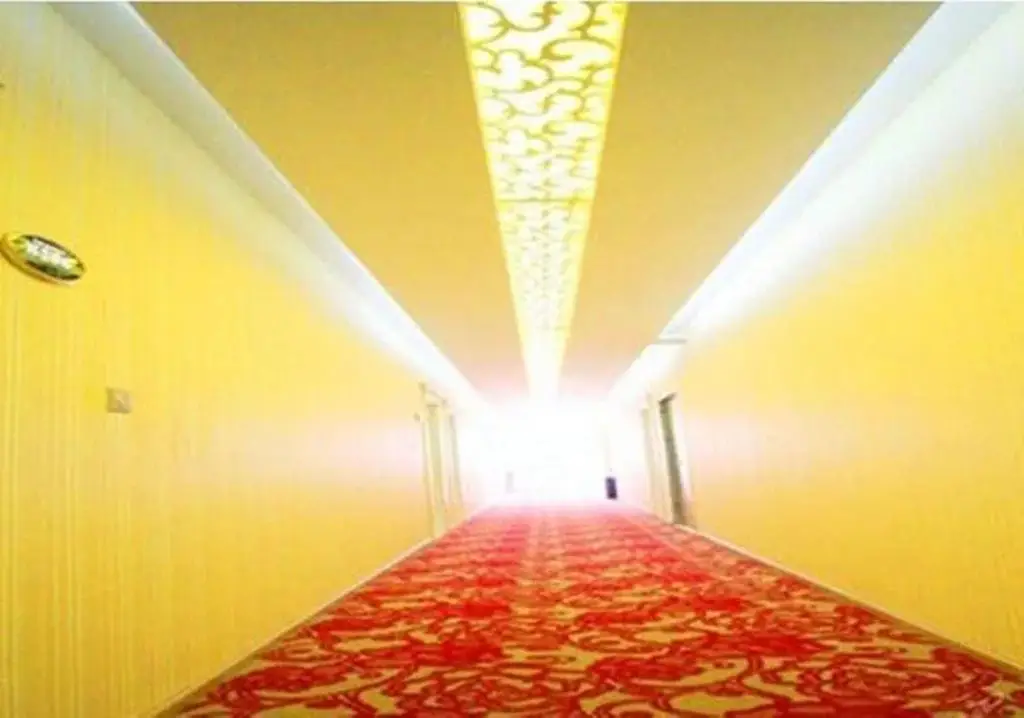 Дали: Mingge Busniess Hotel
