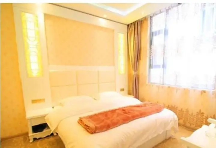 Дали: Mingge Busniess Hotel