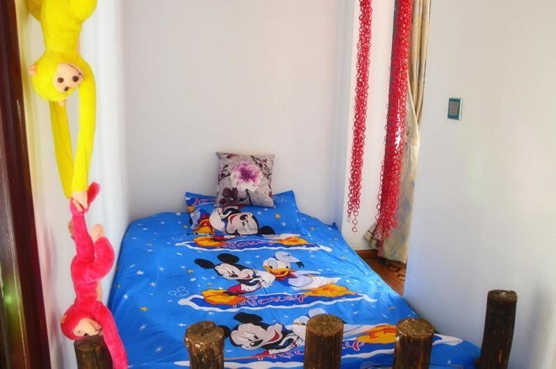 Дали: Dali Huabanli Hostel