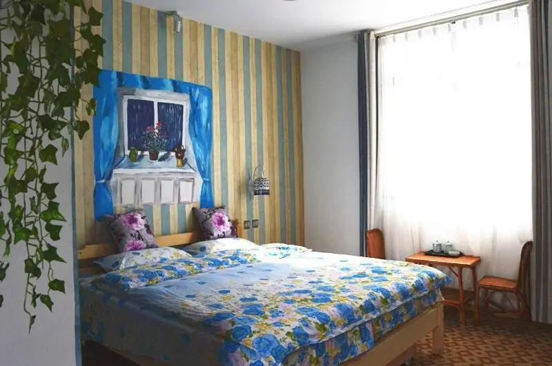 Дали: Dali Huabanli Hostel