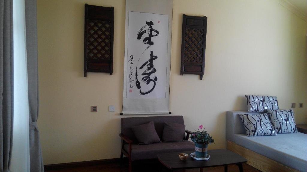 Дали: Mu Zi Li Hostel