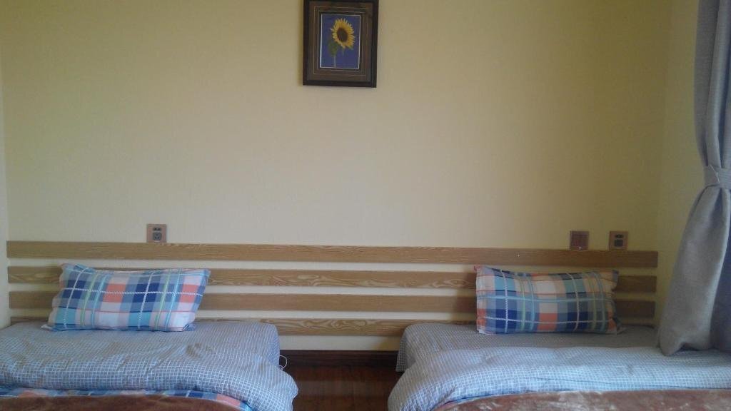 Дали: Mu Zi Li Hostel