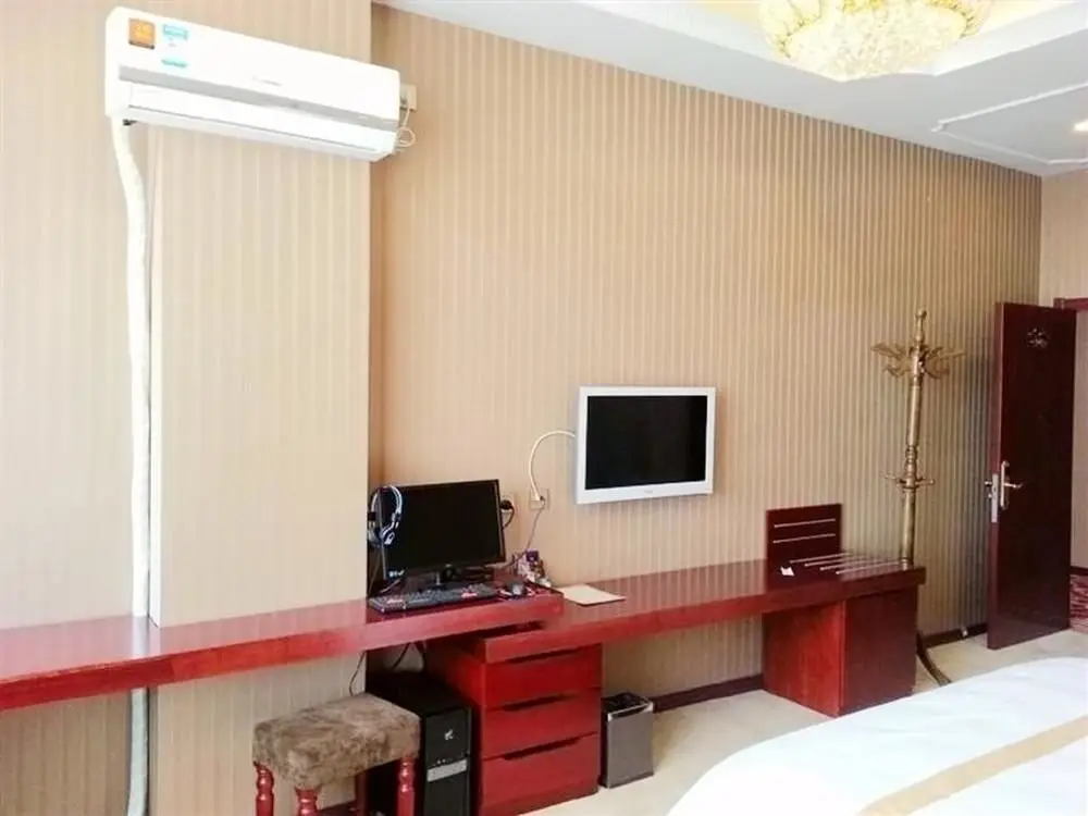 Далянь: Junhao Business Hotel