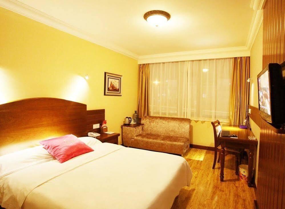 Циндао: Izunco Inn Qingdao TV Mansion