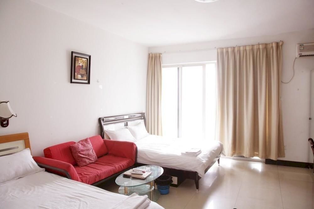 Гуанчжоу: She Hehe Service Apartment (Guangzhou Weinan University  Subway Station)