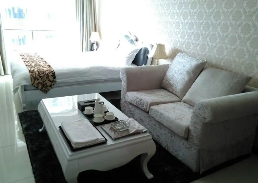 Гуанчжоу: She Hehe Service Apartment (Guangzhou Weinan University  Subway Station)