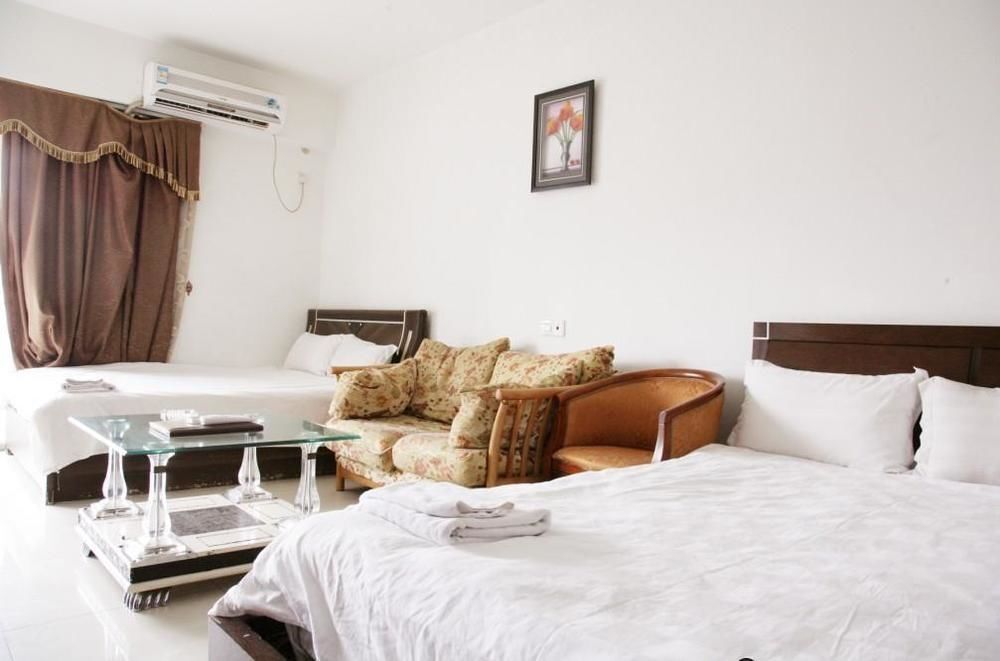 Гуанчжоу: She Hehe Service Apartment (Guangzhou Weinan University  Subway Station)