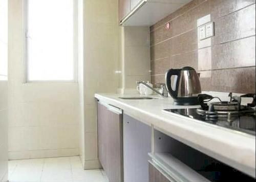 Гуанчжоу: She Hehe Service Apartment (Guangzhou Weinan University  Subway Station)