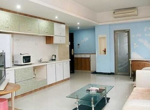 Гуанчжоу: She Hehe Service Apartment (Guangzhou Weinan University  Subway Station)