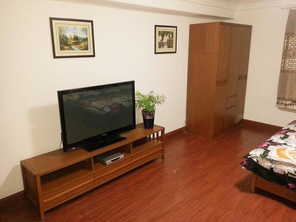 Далянь: Dalian Luoman Apartment Hotel