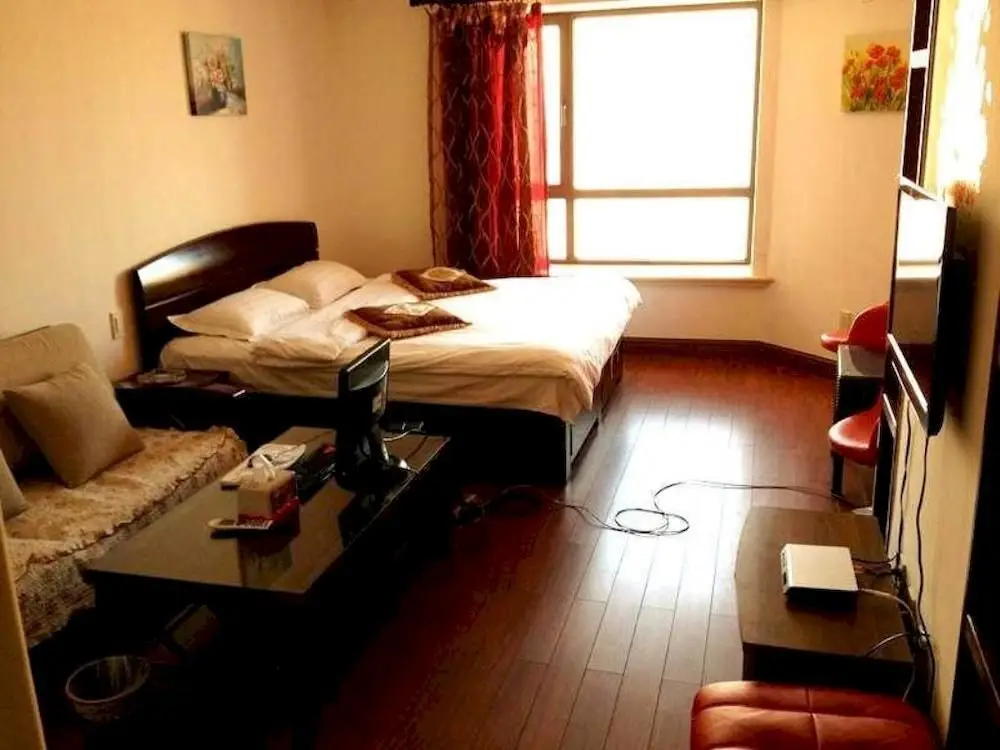 Далянь: Dalian Luoman Apartment Hotel