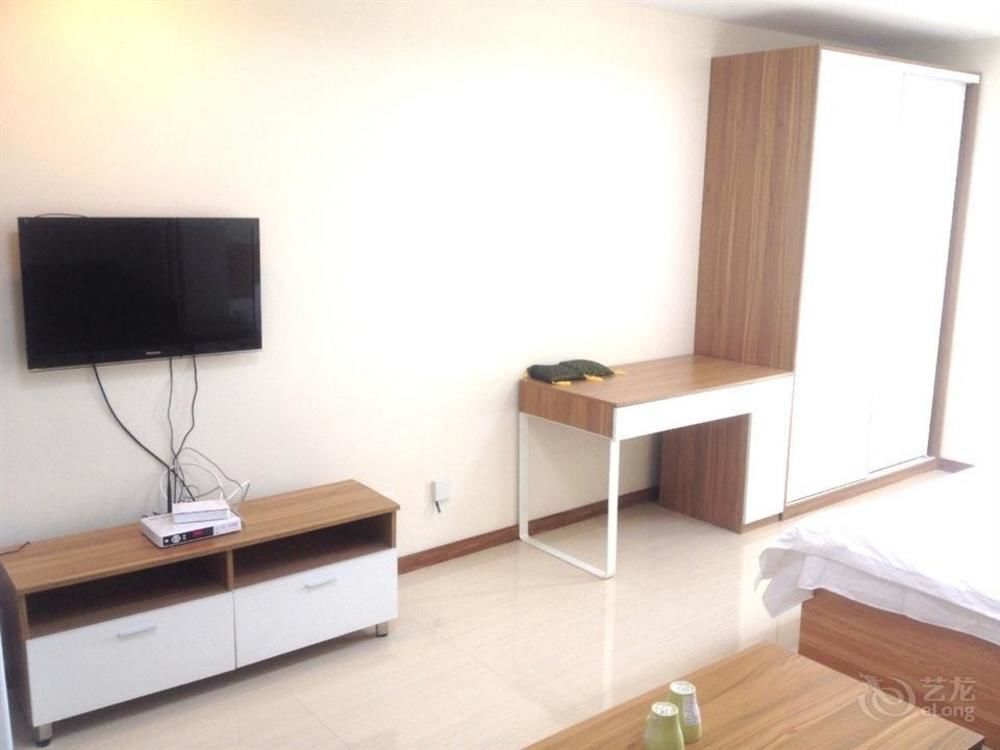 Далянь: Sunshine Service Apartment