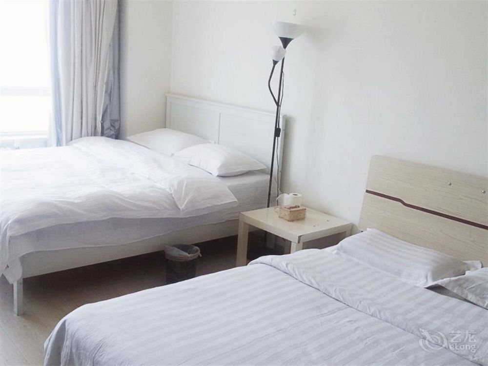 Dalian Shun Xin Hotel Apartment — фото 1