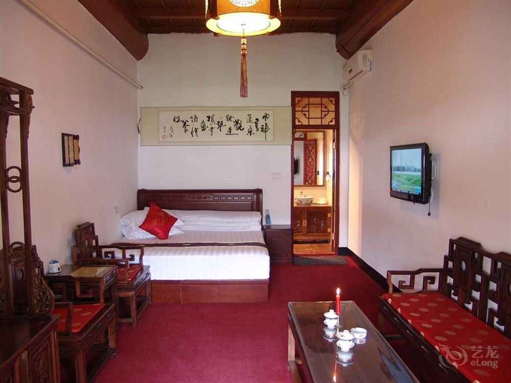 Pingyao Xing Long Yi Guesthouse — фото 1