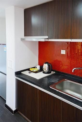 Далянь: Dalian Parkland Ming Jie Hotel Style Apartment