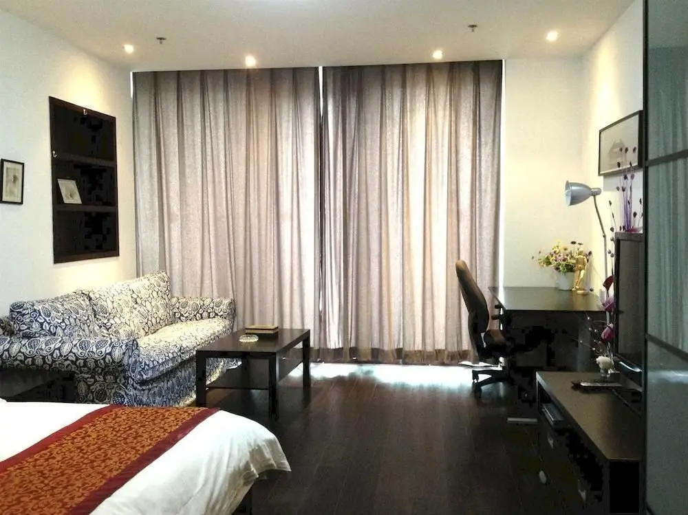 Далянь: Dalian Parkland Ming Jie Hotel Style Apartment