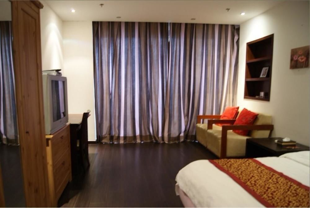Далянь: Dalian Parkland Ming Jie Hotel Style Apartment