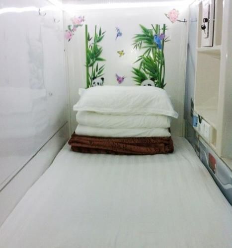 Qingting Capsule Hotel Apartment — фото 1