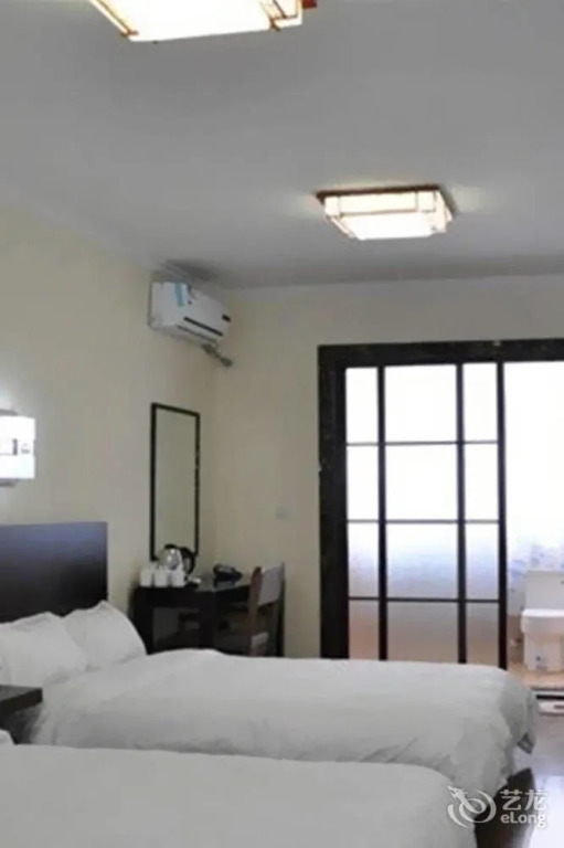 Циндао: QIANXIYUcourtyard traders hotel