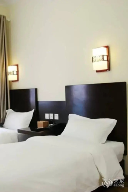 Циндао: QIANXIYUcourtyard traders hotel
