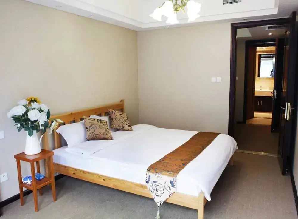 Далянь: Yijia Hotel Apartment Dalian (Xinghai Daguan)