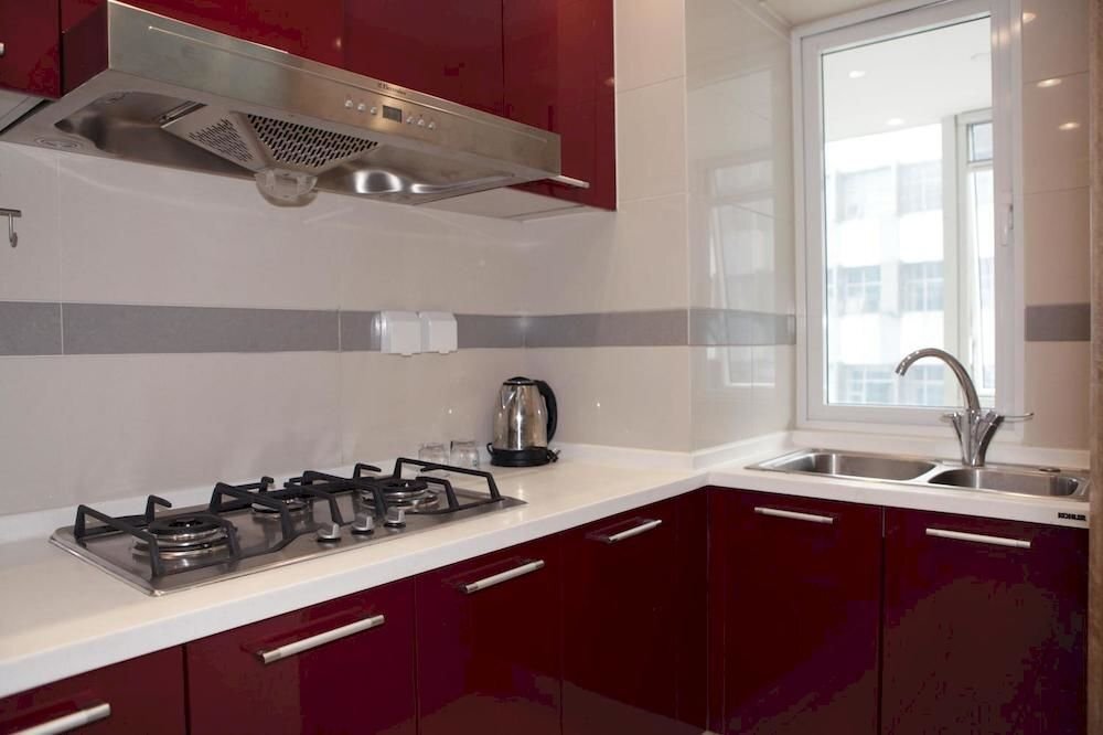 Далянь: Yijia Hotel Apartment Dalian (Xinghai Daguan)