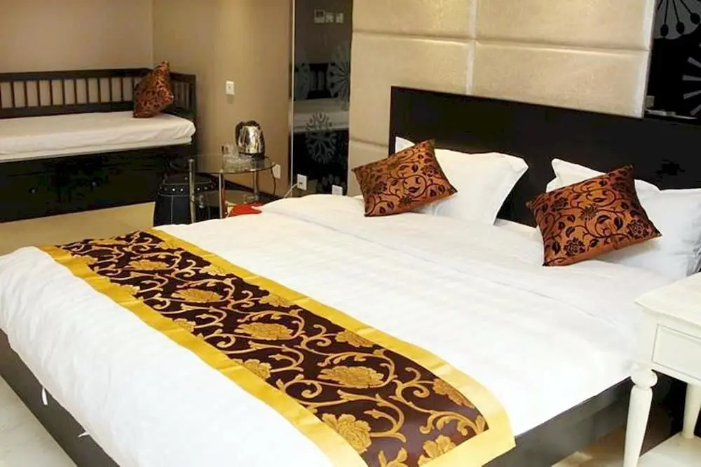 Далянь: Yijia Hotel Apartment Dalian (Xinghai Daguan)
