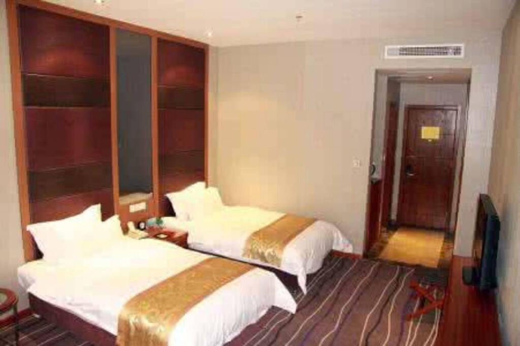 Циндао: Xinfusheng Yihai International Hotel - Qingdao