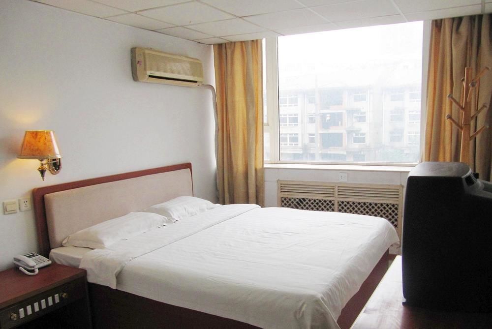Далянь: Xinyue Business Hotel