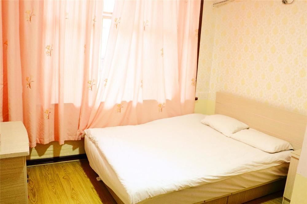 Циндао: Qingdao Peninsula Four Seasons Business Hotel
