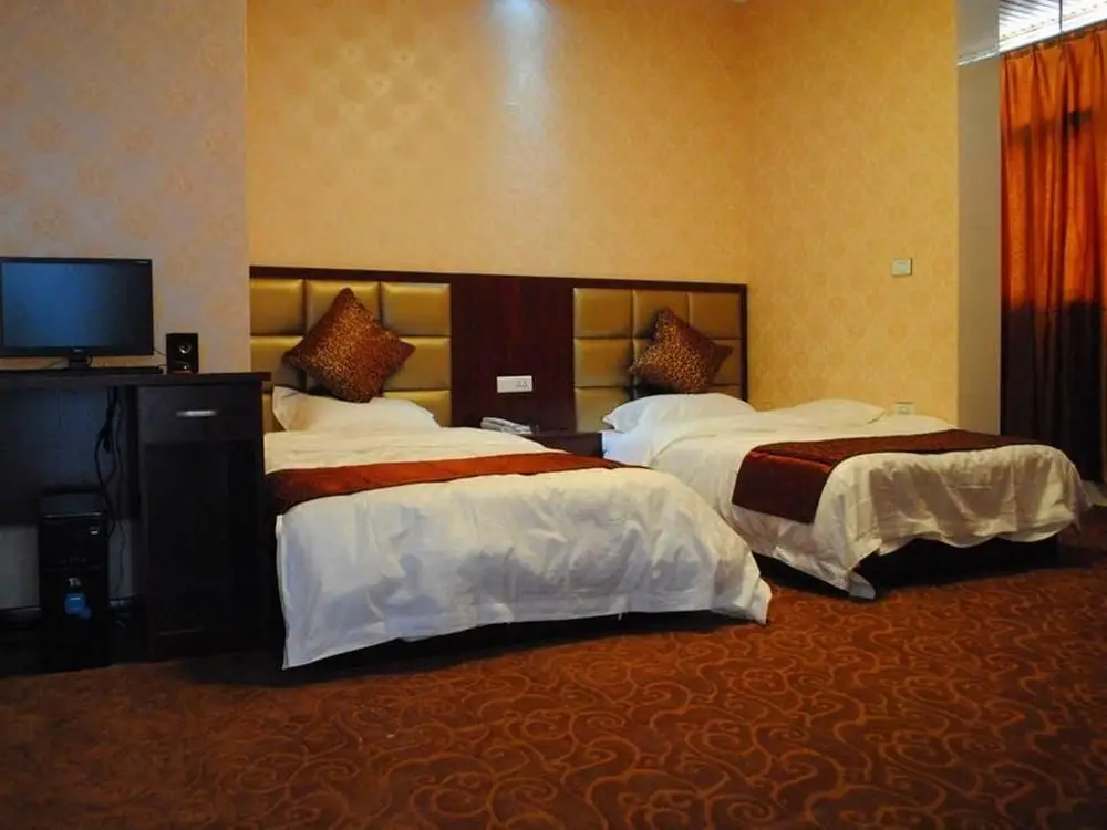 Bed on Journey Business Hotel — фото 1