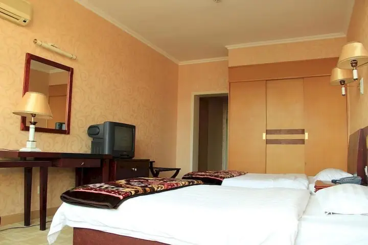 Циндао: Qindao Yongbao Garden Hotel
