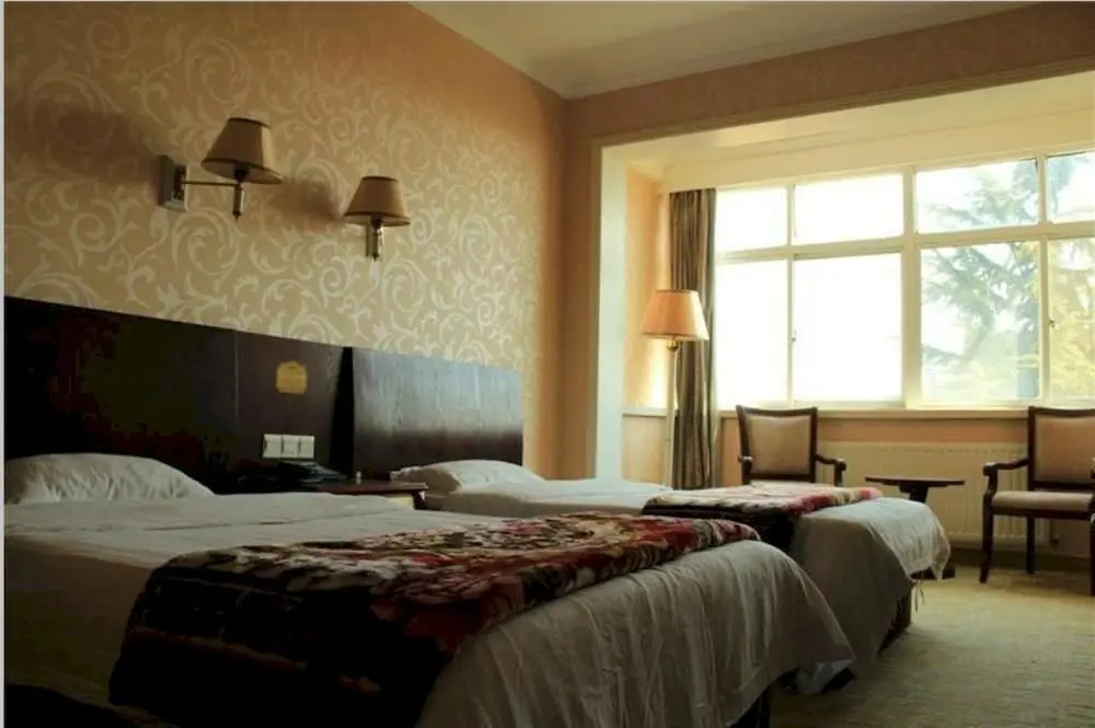 Циндао: Qindao Yongbao Garden Hotel