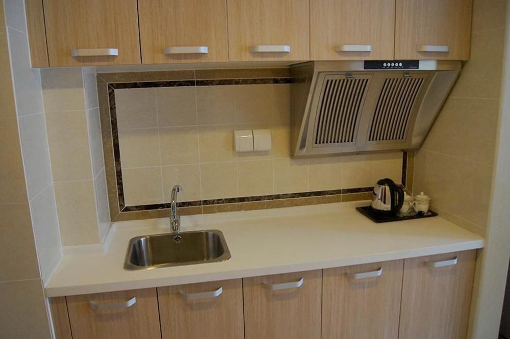 Далянь: Best Coast Hotel Apartment