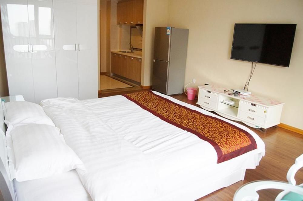 Далянь: Best Coast Hotel Apartment